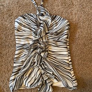 Tie around the necklace and open back top.